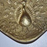 Brass pocket with peacock decoration
