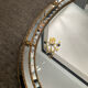 Vintage mirror in solid wood with brass and parcloses.