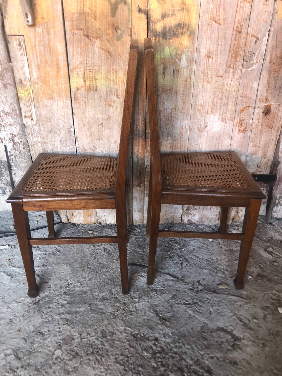 Pair of art deco chairs in wood & cane seat