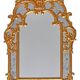Console with a gilded wood mirror in Rococo style.