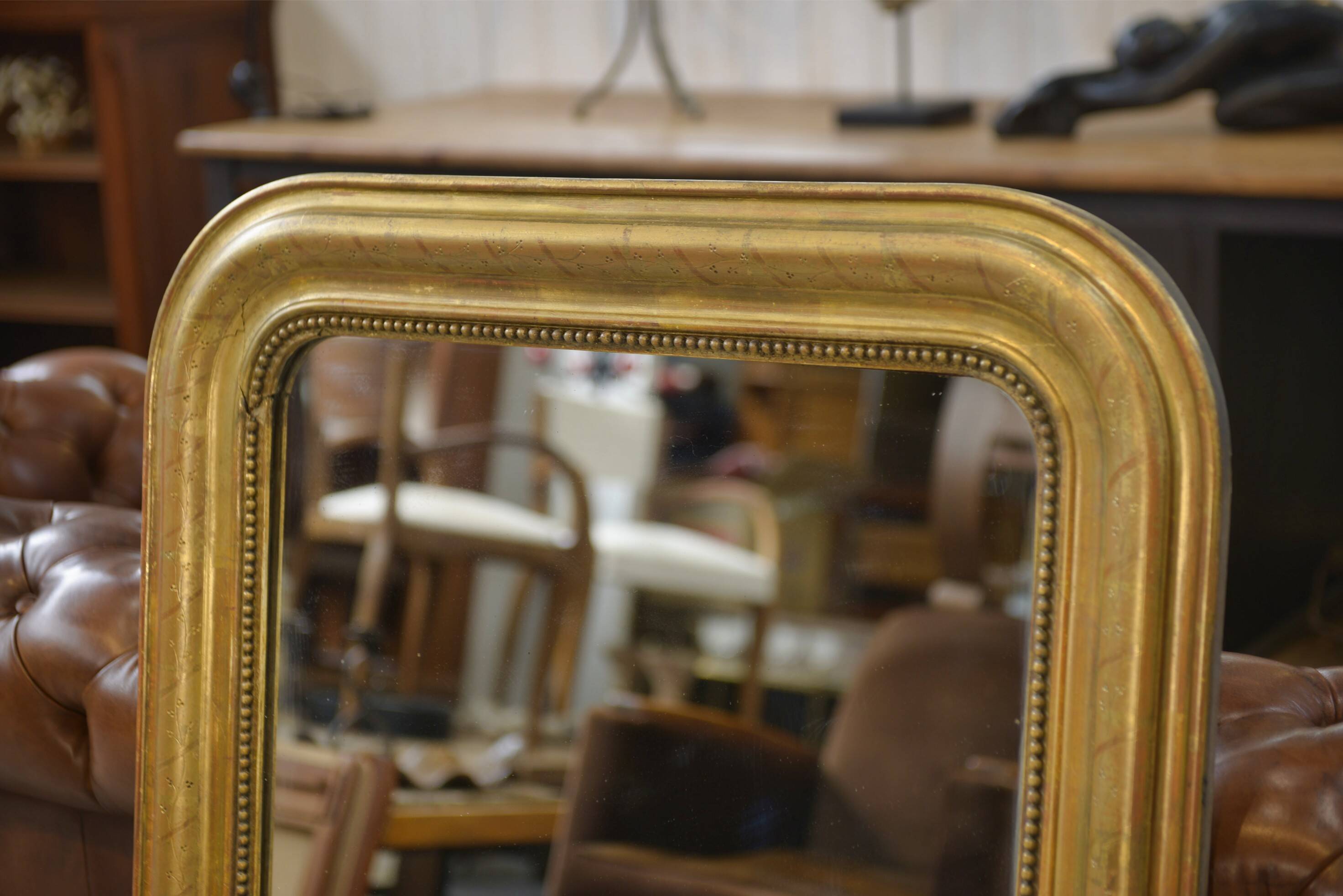 Mercury mirror from the Louis Philippe period, gilded with gold leaf, 19th century.