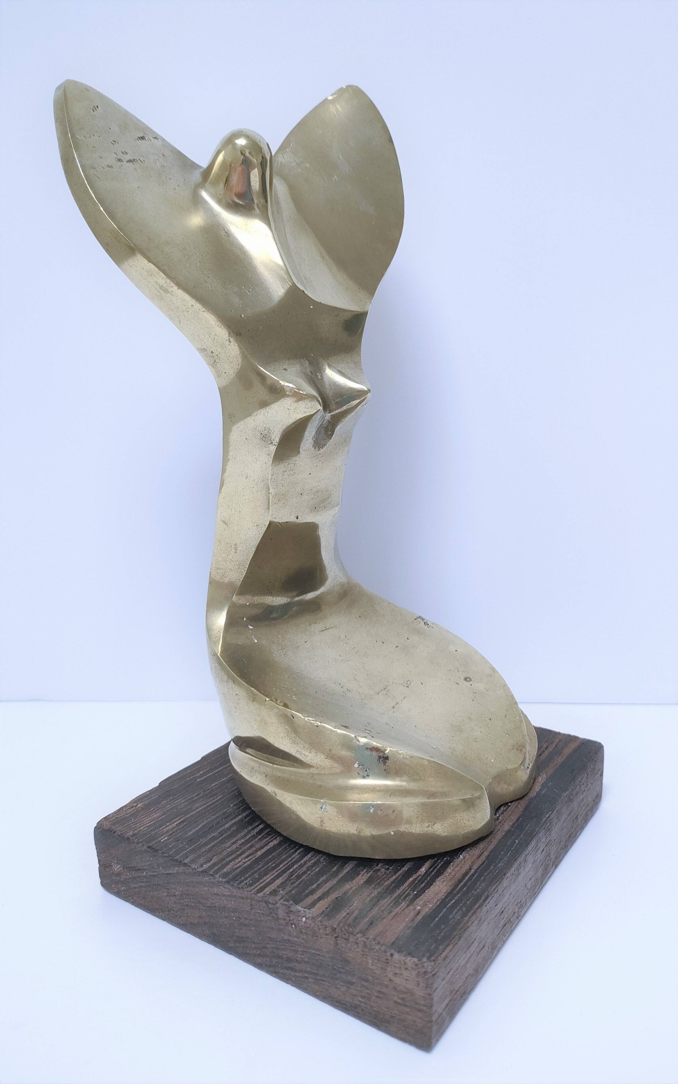Gilded bronze and sculptural wood paperweight