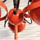 Suspended eyeballs, space age, bright orange, vintage, 70s