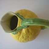 Vintage pitcher has form of lemon