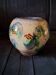 Round vase with floral decoration