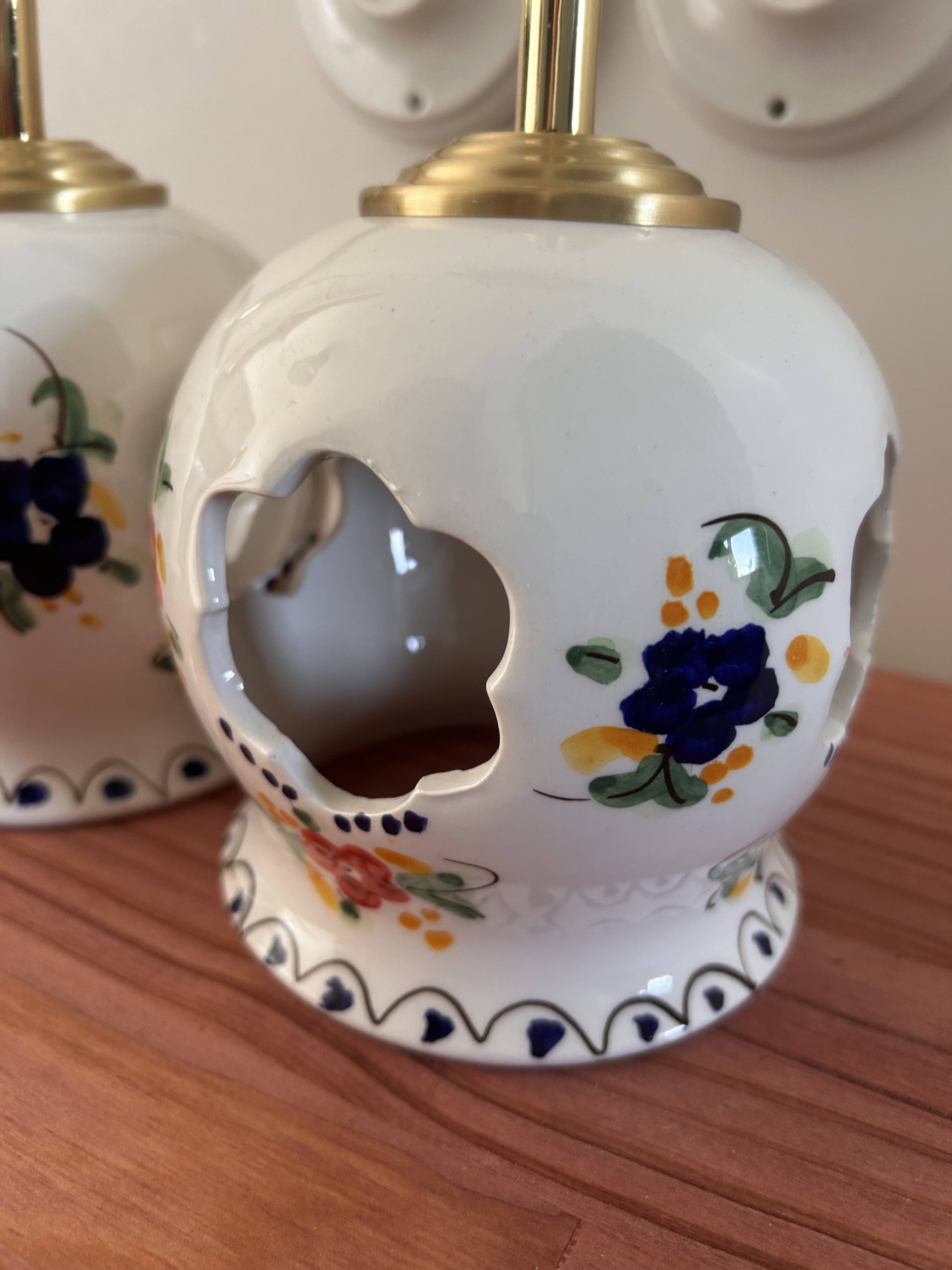 Pair of openwork ceramic wall lights