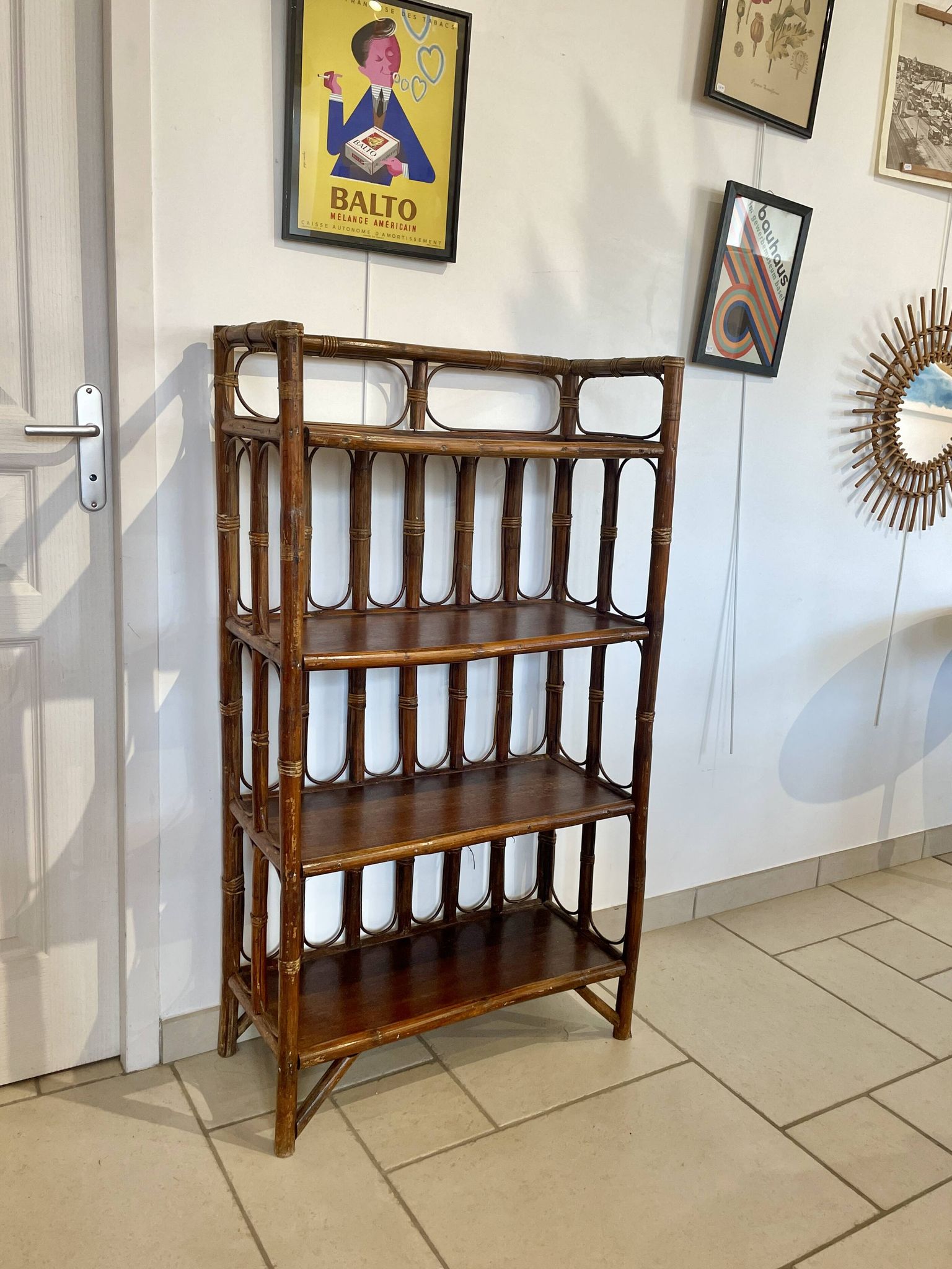 Shelf on rattan and bamboo legs from the 70s