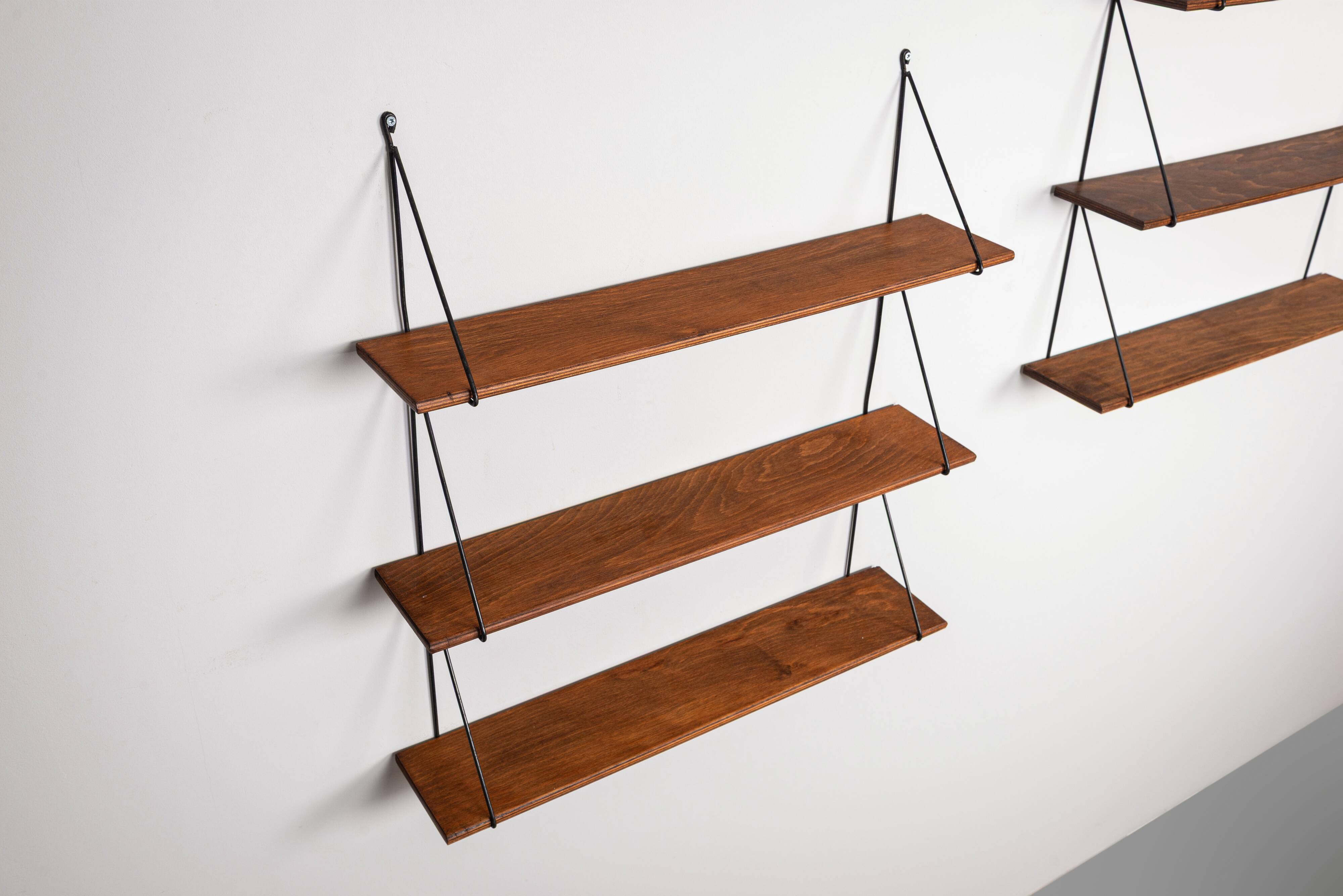 Set of minimalistic wooden shelving units