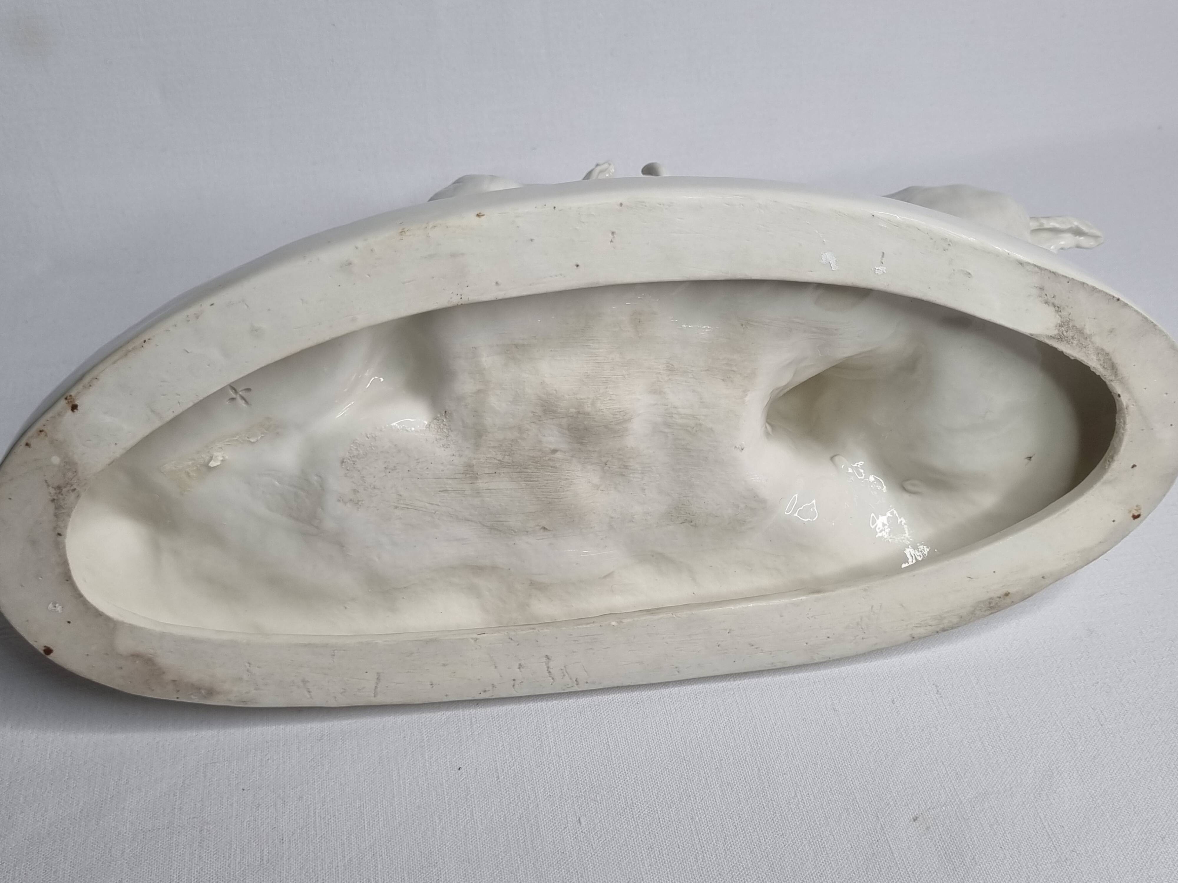 Saxon porcelain group, two fighting goats, signed Röhle, 1900