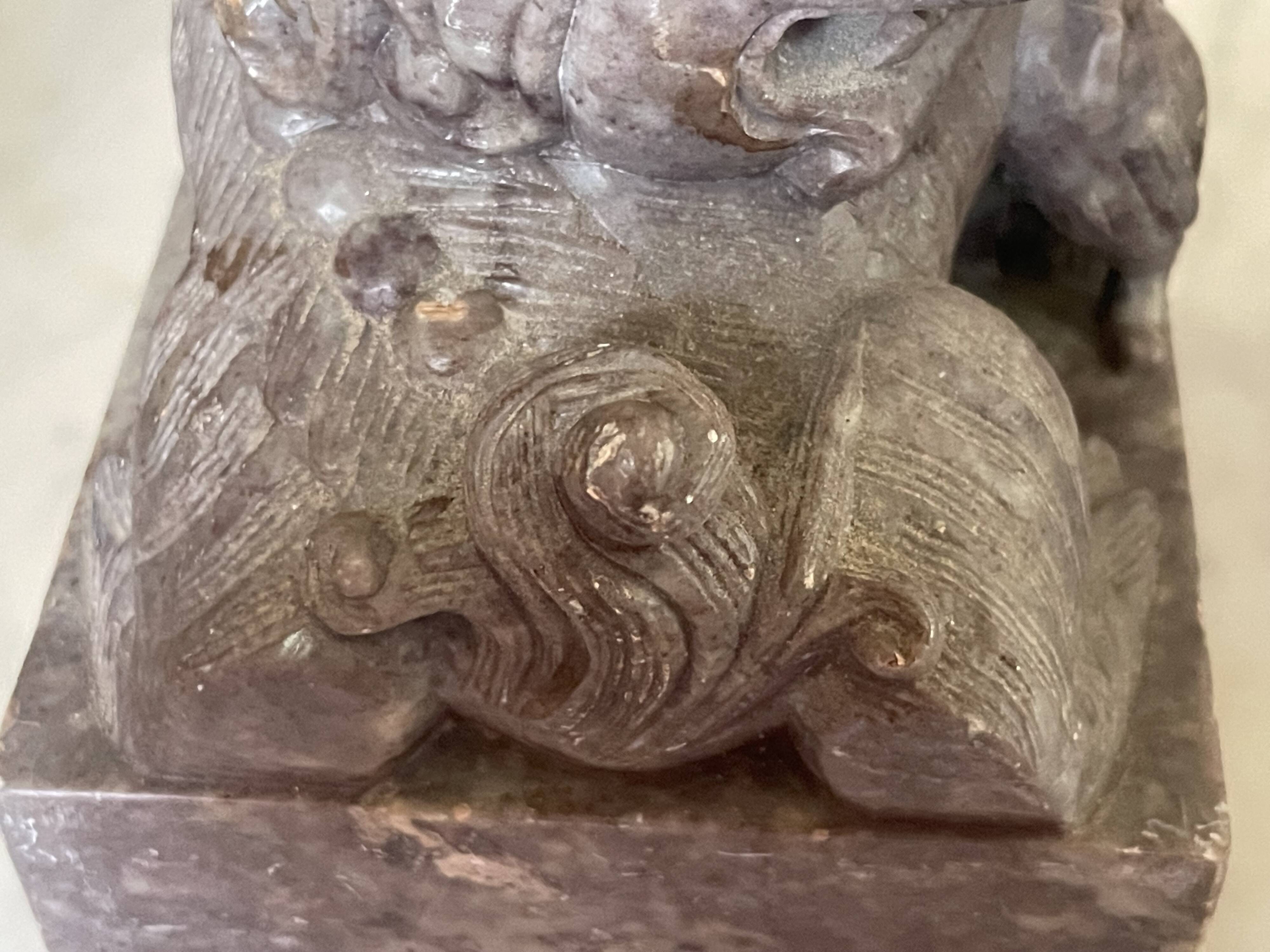 Pair of Foo Dog bookends in sculpted steatite.