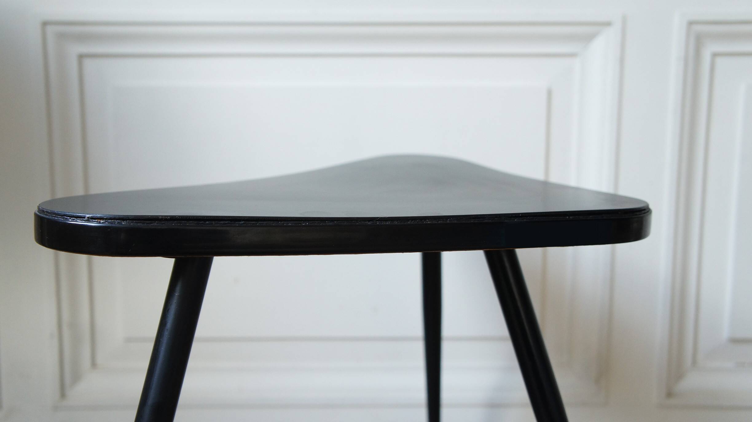 Black formica tripod side table