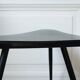 Black formica tripod side table