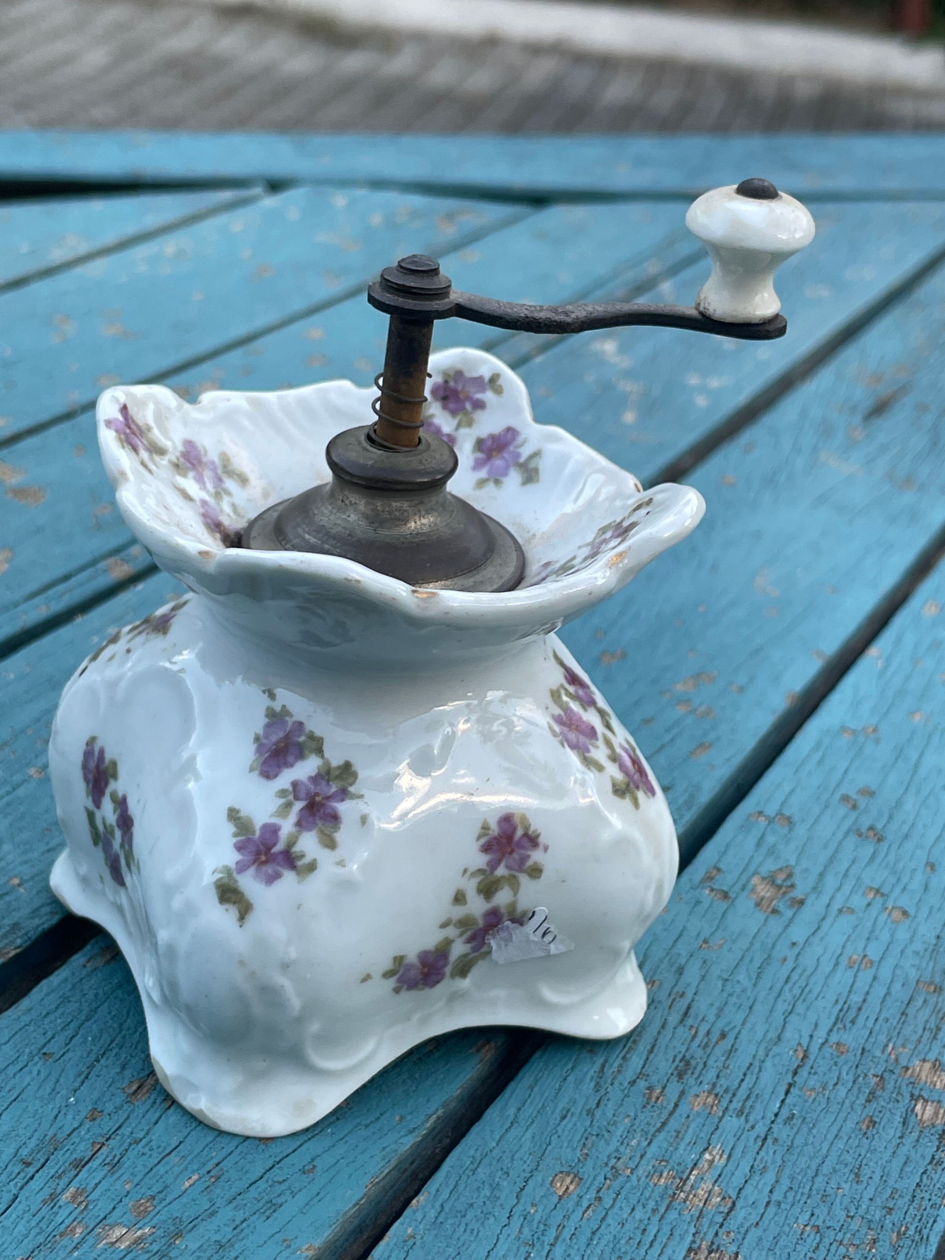 Old porcelain pepper mill