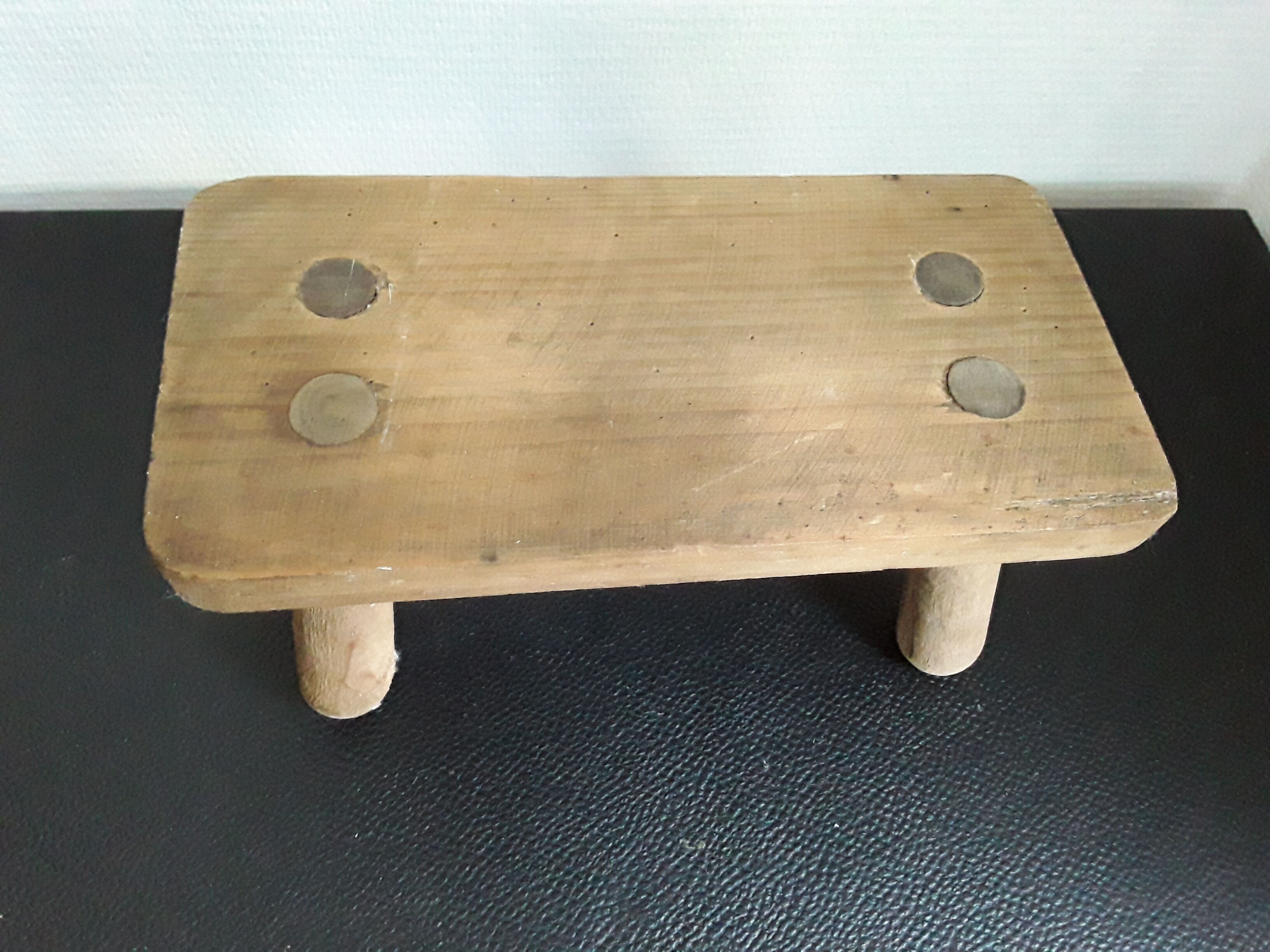 Vintage footstool in light wood