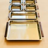 Service of Scandinavian dishes in stainless steel and teak 1970