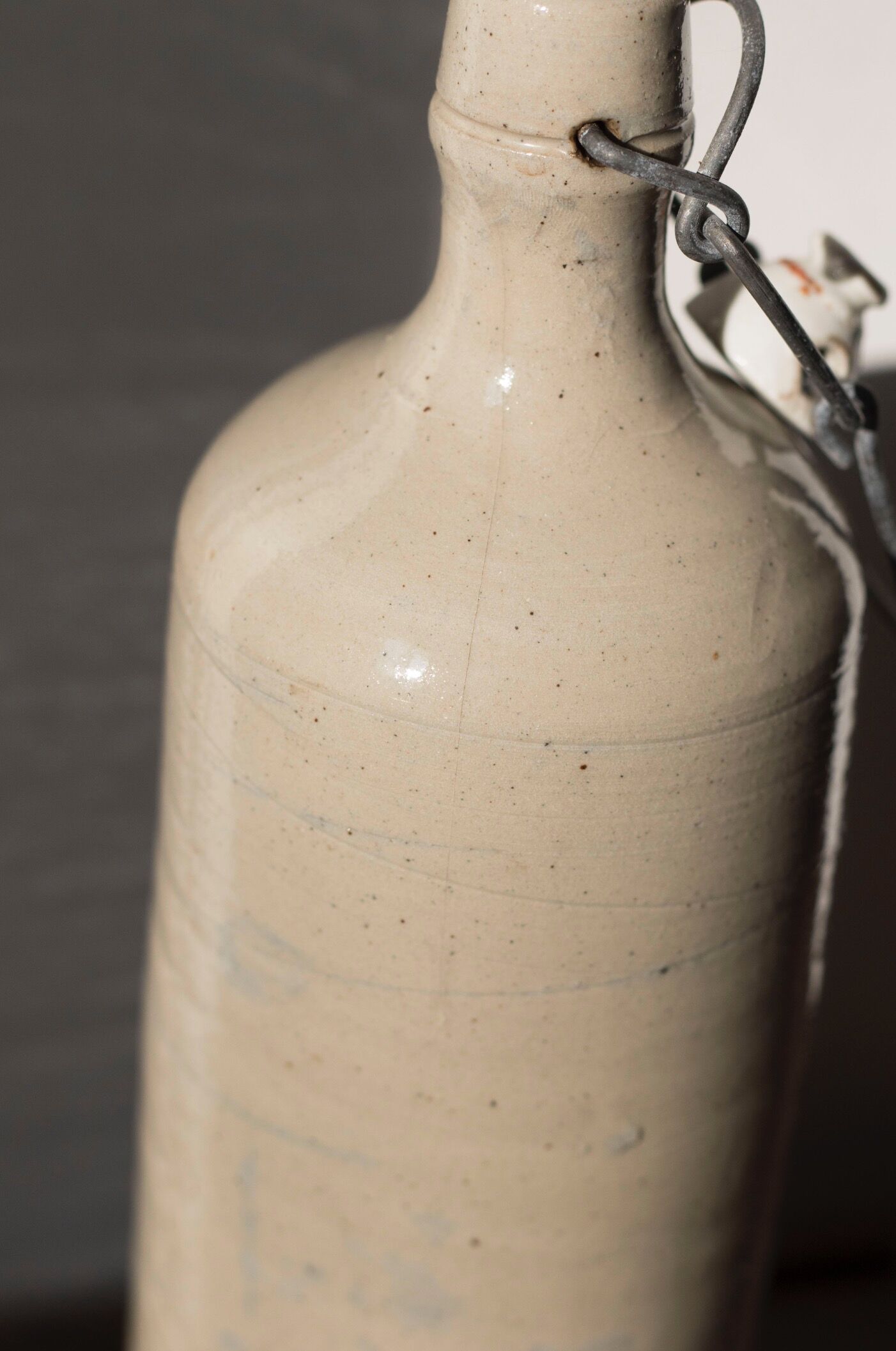 Bottle of enamelled stoneware hot water bottle