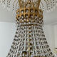 Chandelier cascade of tassels and brass