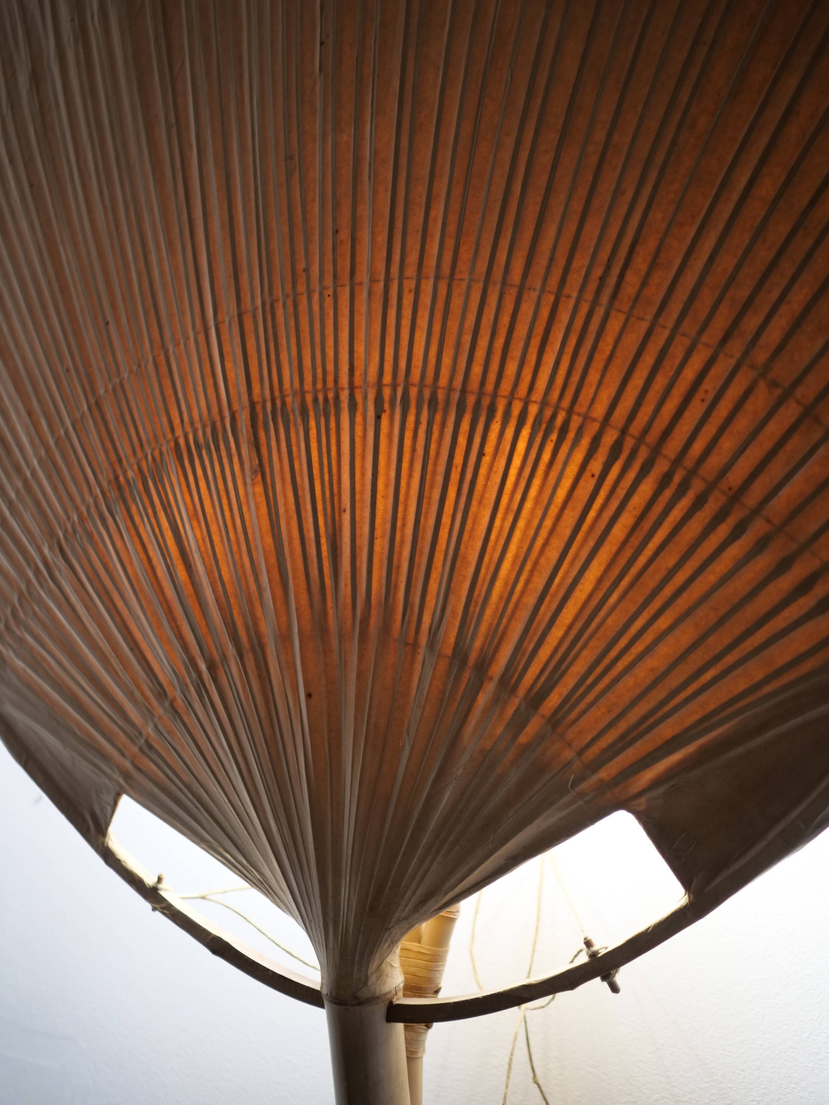 Large-format Uchiwa light fixture designed by Ingo Maurer