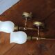 Pair of vintage Lunel house wood and brass wall lights