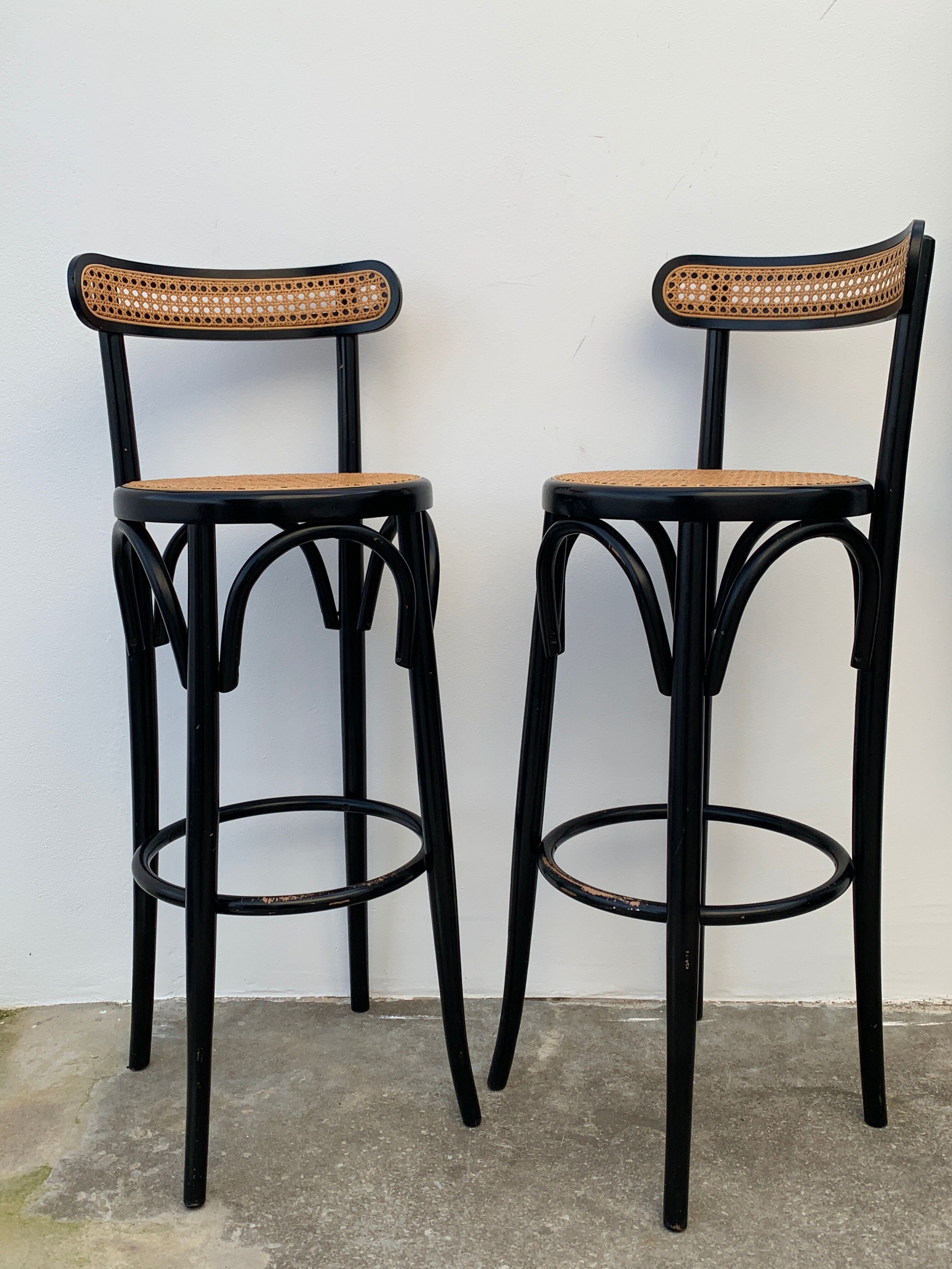 Pair of high canne stools or black curved wooden bar chairs, 1970