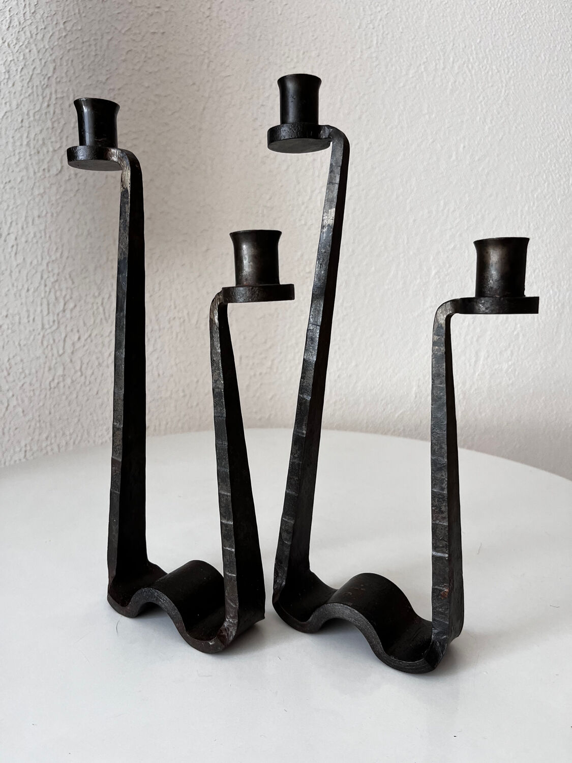 Brutalist wrought iron candlestick pair