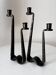 Brutalist wrought iron candlestick pair