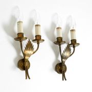 A pair of mid-century modern brass wall lamps by Vereinigte Werkstätten