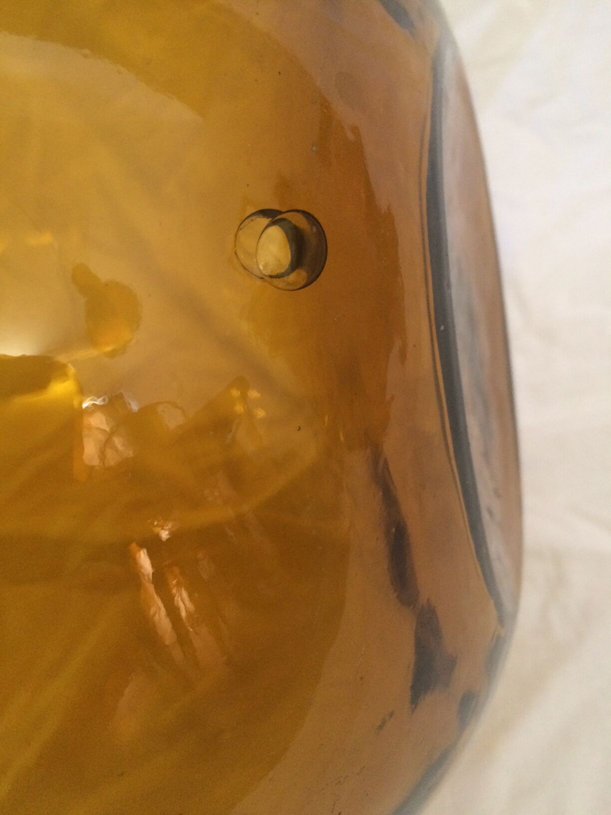 Transparent amber demijohn of 10L