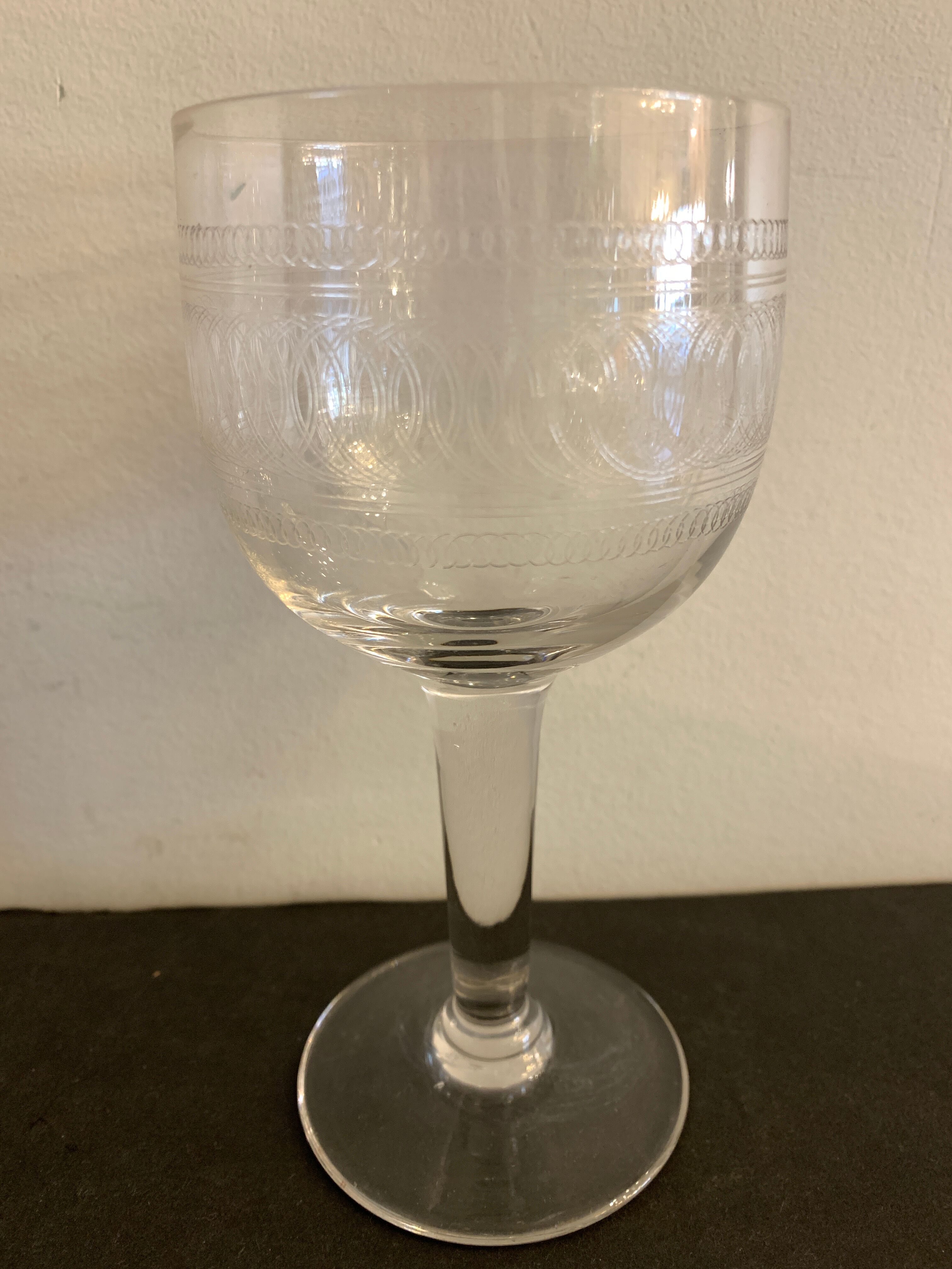 10 blown and engraved stemmed glasses