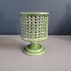 Ceramic flowerpot on stand