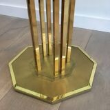 Designer coffee table in brass and glass