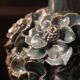 Pair of iridescent light blue lamps, featuring a floral bush design