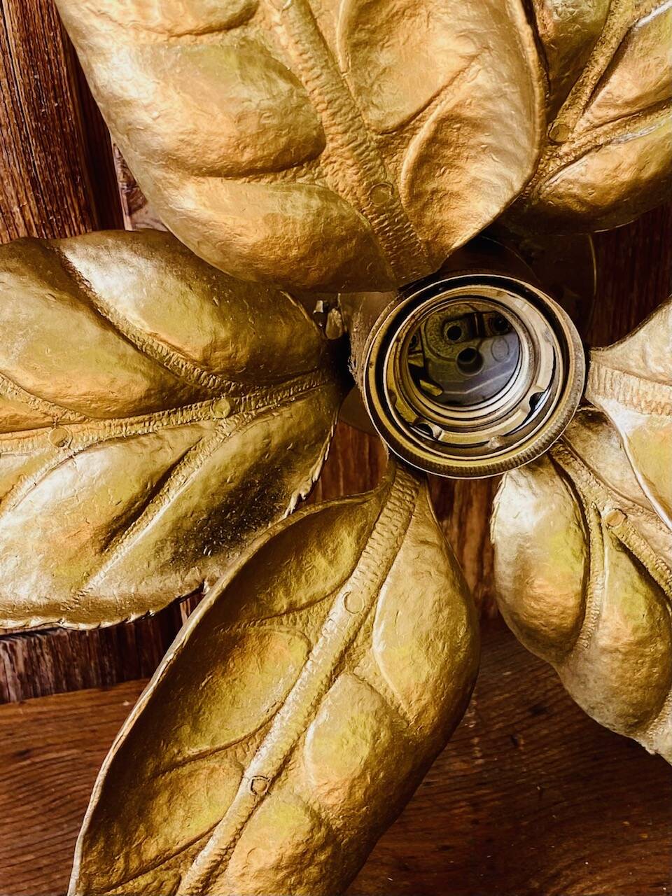 Gold metal flower wall light