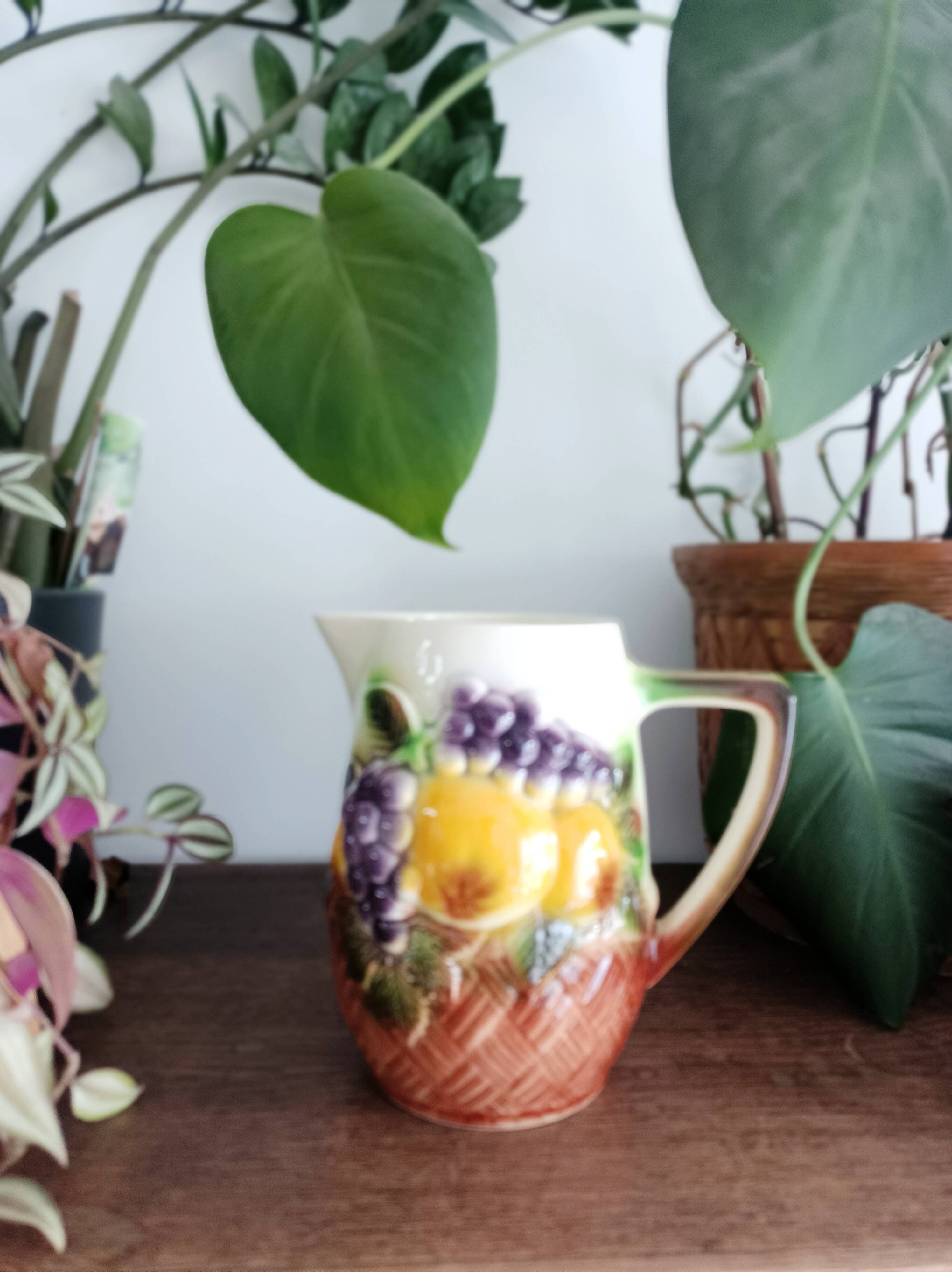 St-Clément pitcher in slip, fruit decoration