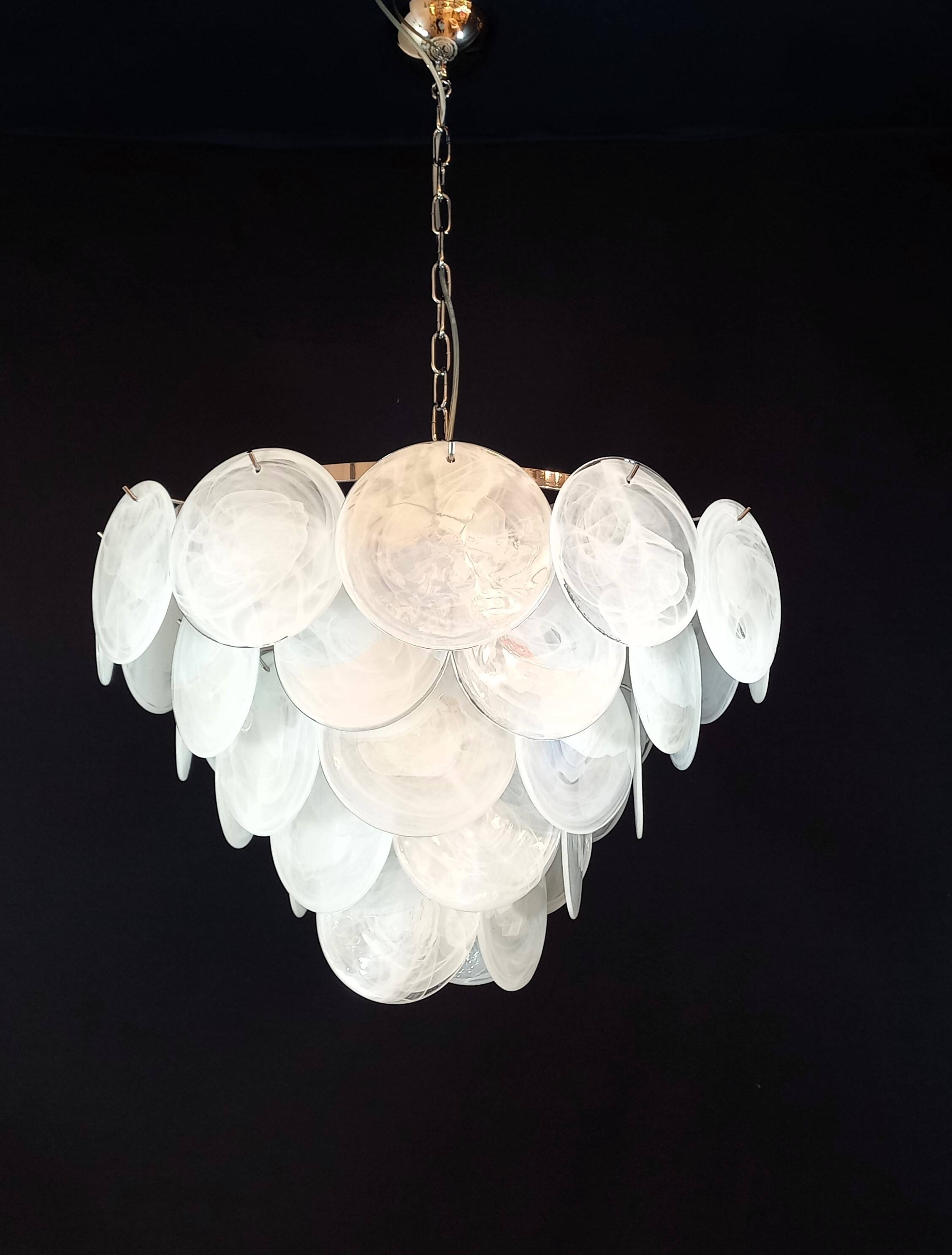 Handcrafted chandelier with Murano glass and handmade alabaster discs.