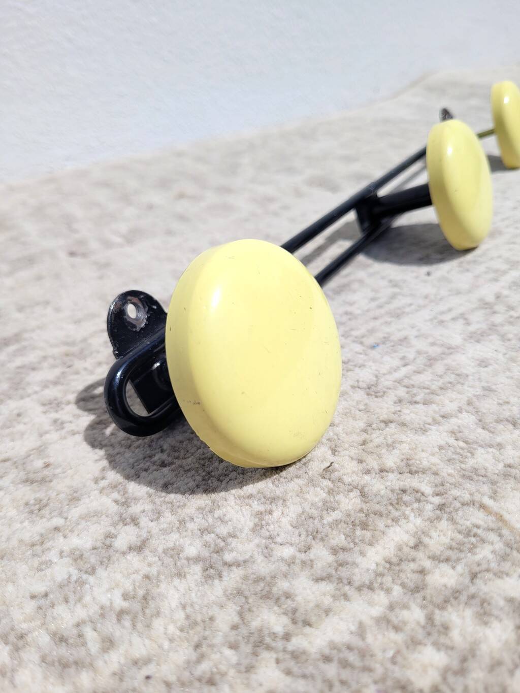 60s yellow wall coat rack