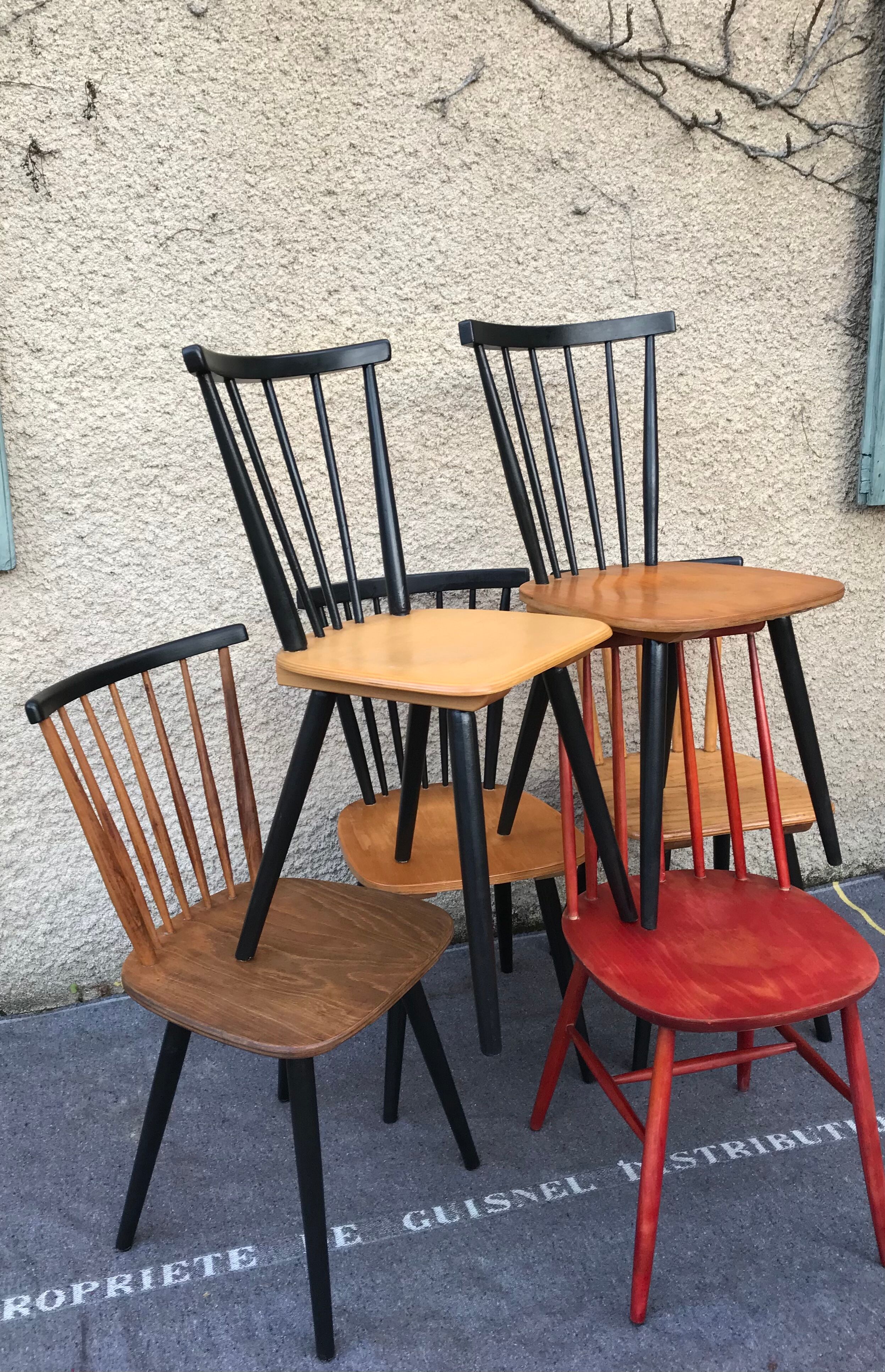 Set of 6 mismatched vintage chairs with bars and compass legs