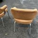 Paire de fauteuils vintage à piètement métal et tissu orange 60 70
