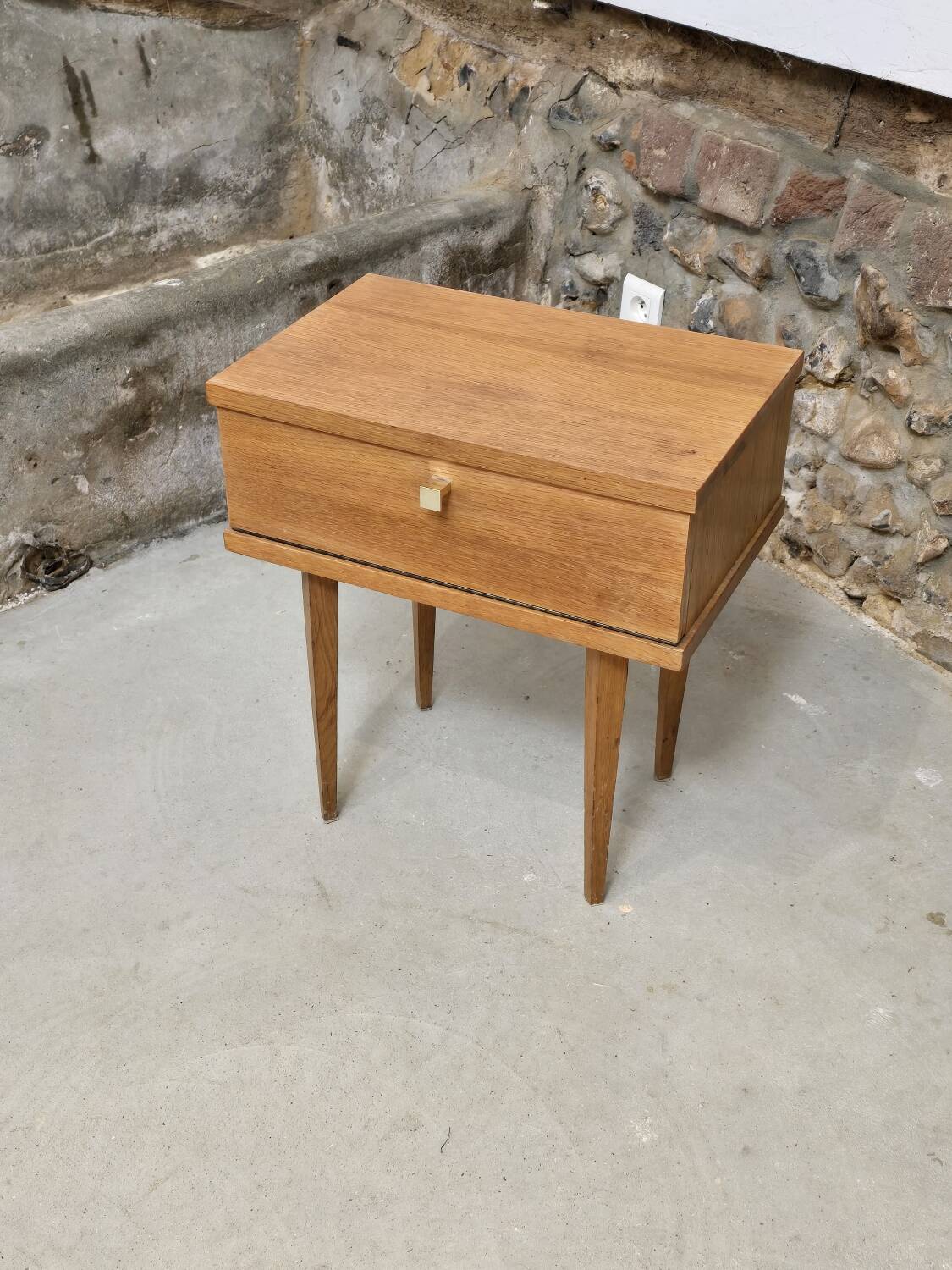 Scandinavian bedside table with hinged drawer