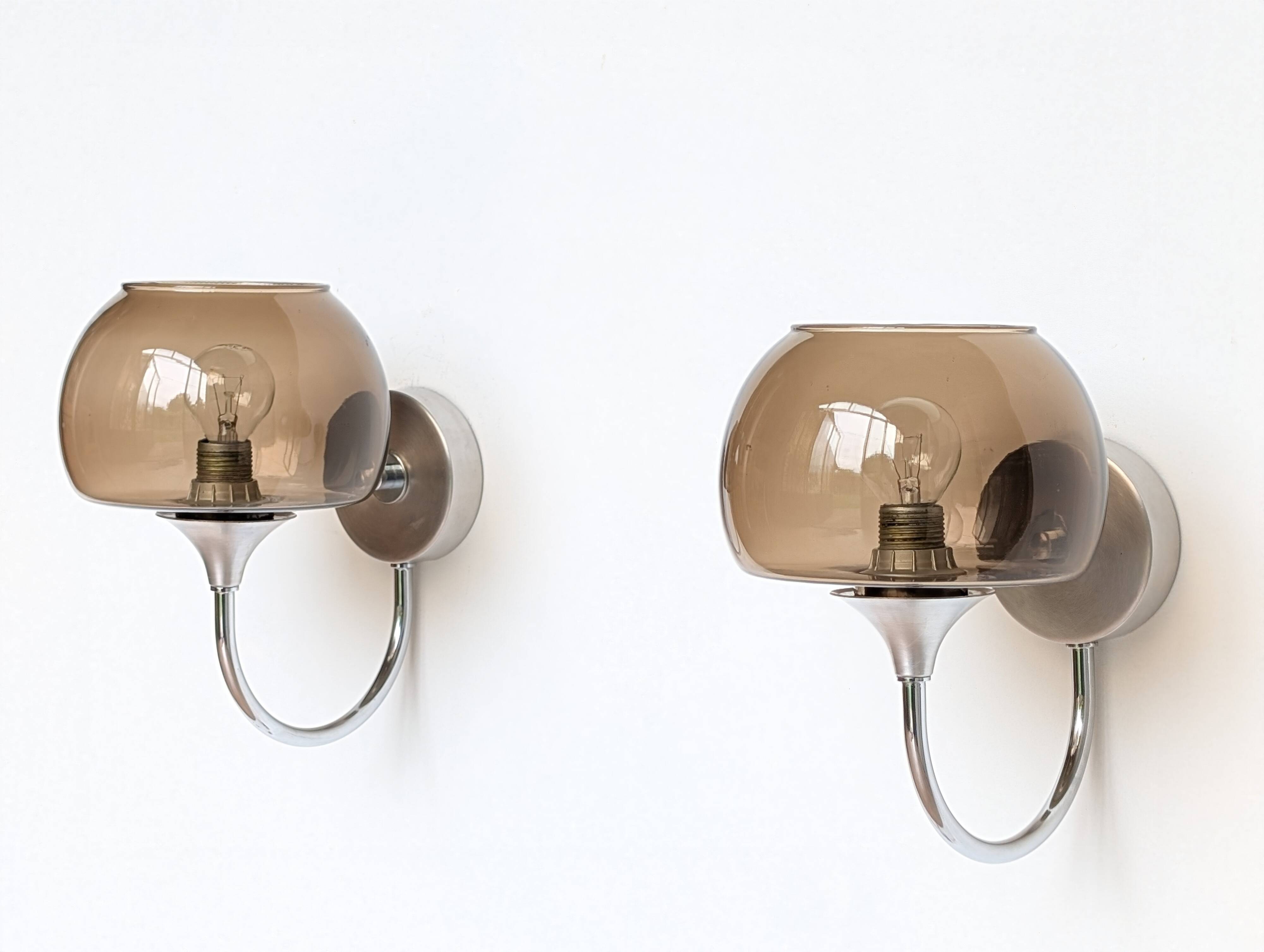 Pair of chrome and glass wall lights