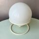 Vintage light bulb lamp on metal support 1980