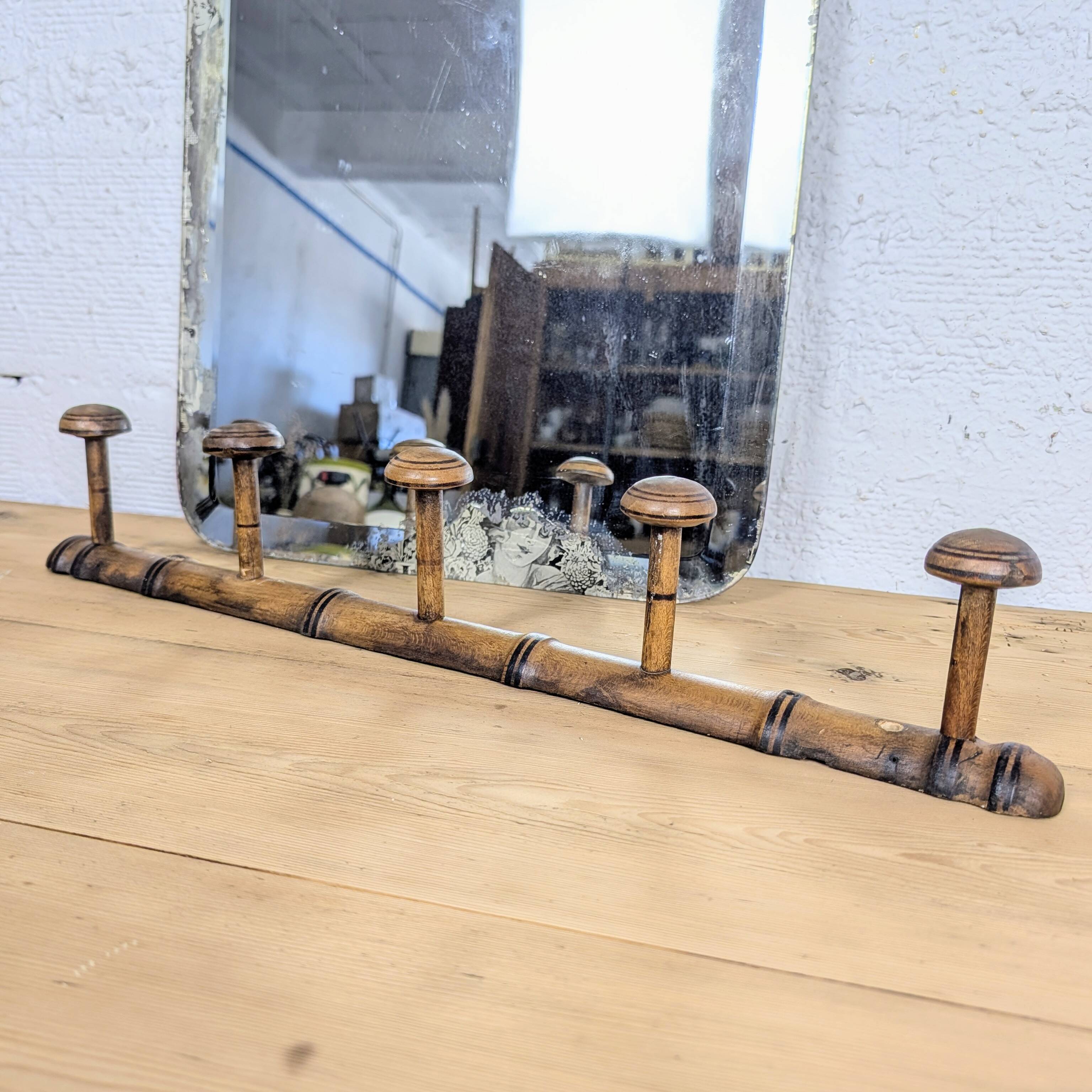 Turned wooden coat rack