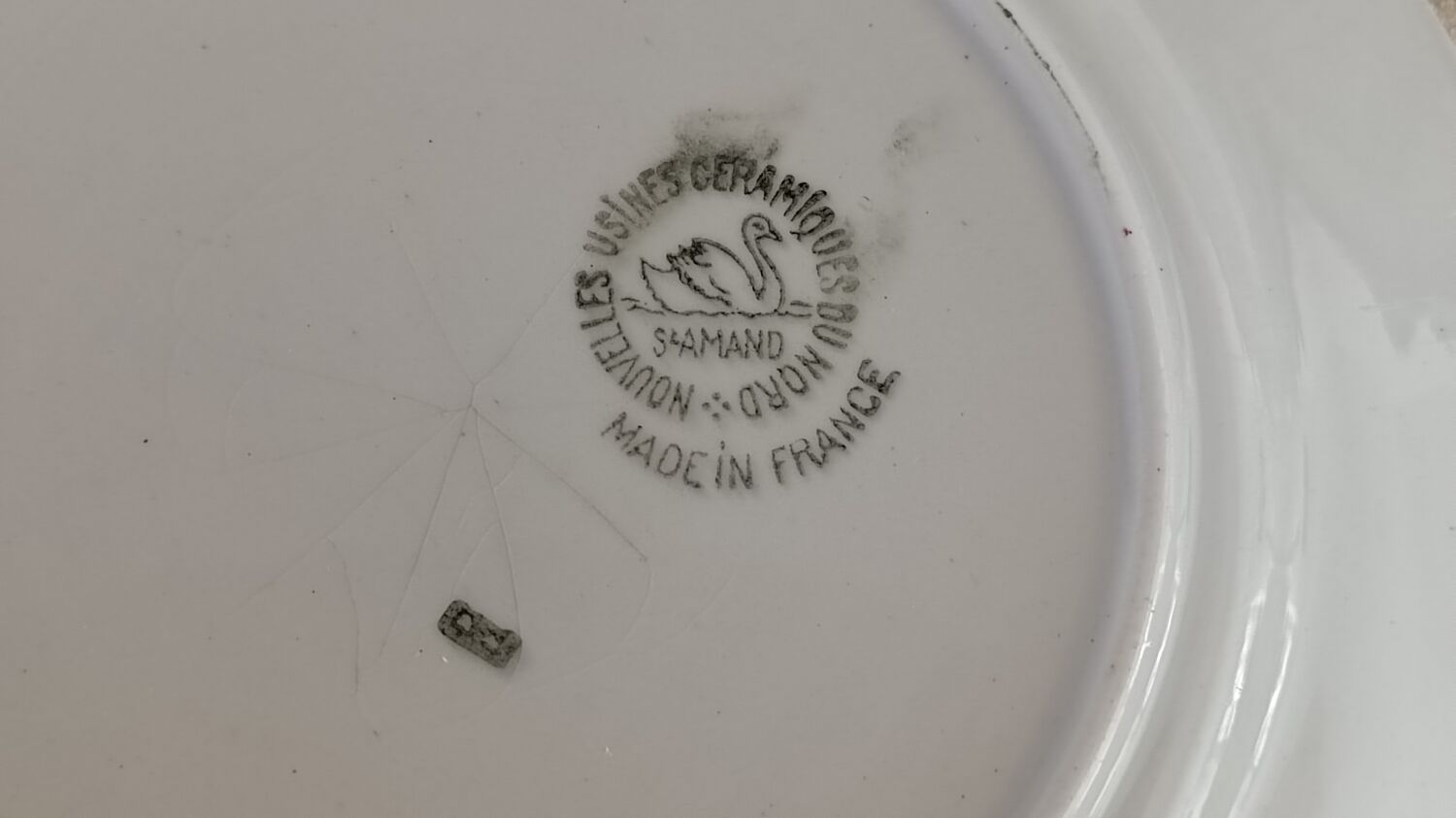 2 Saint Amand plates with castle decor