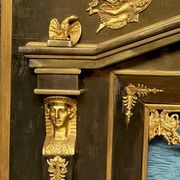 Empire-style fireplace decoration.