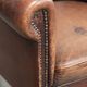 Sheepskin club armchair with patina in a subtle size and a vintage look
