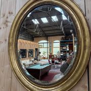 Oval mirror Napoleon III – Gilded with gold leaf – Wood and stucco