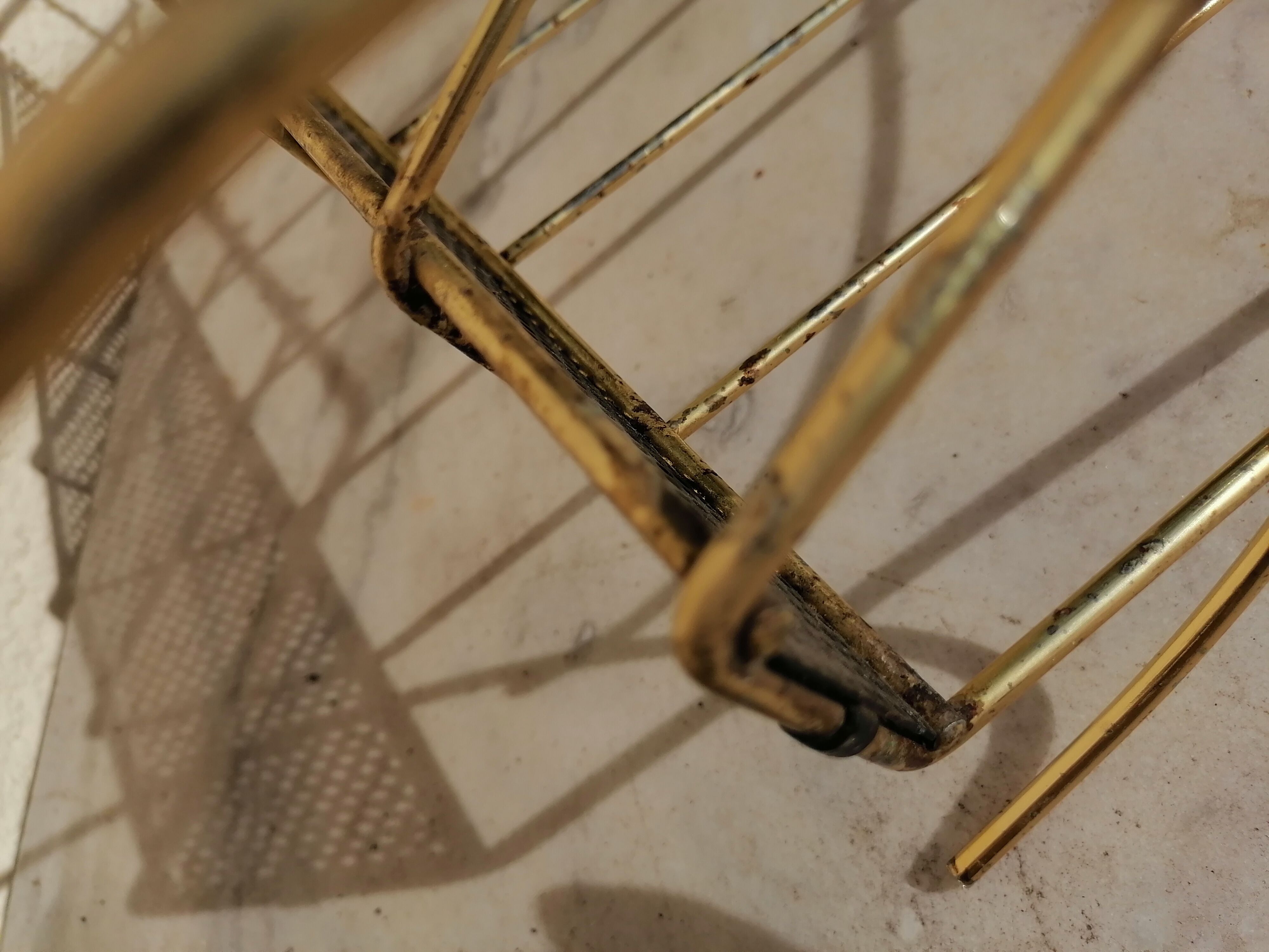 Vintage metal metal perforated magazine holder