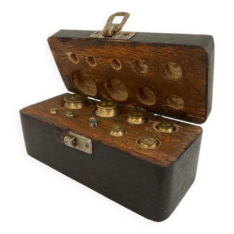 Balance weight in their wooden box