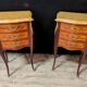 Louis XV style commode with marquetry and its pair of bedside tables.
