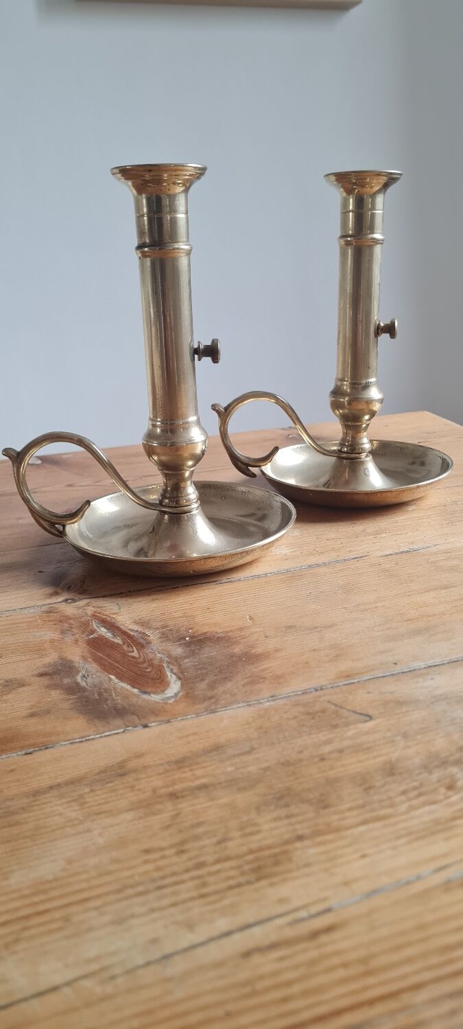 Pair of brass candle holders